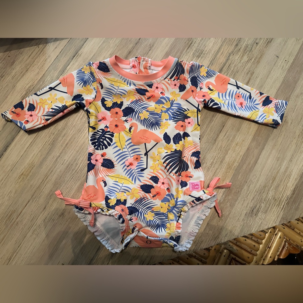 Ruffle Butts Swimsuit- Flamingo Print
Size 6-12 months